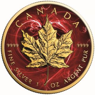 Canada Silver Maple Leaf Coin Passion Red Colorized And Gold Gilded Golden photo
