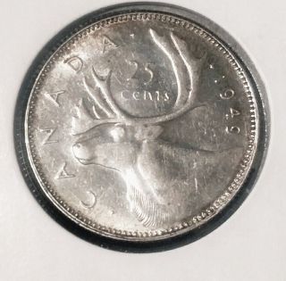 1949 Key Date Bu Silver Canada Quarter. photo
