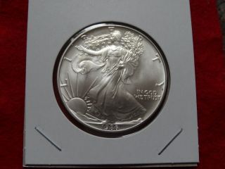 1986 American Unc, .  99.  9 Silver Eagle Dollar 44 photo