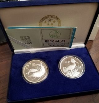 1988 China Wildlife Dolphin And Ibis 10 Yuan Sterling Silver Proof White Haze photo
