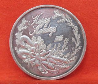 1985 Happy Holidays One Troy Ounce.  999 Fine Silver 1oz Round Coin photo